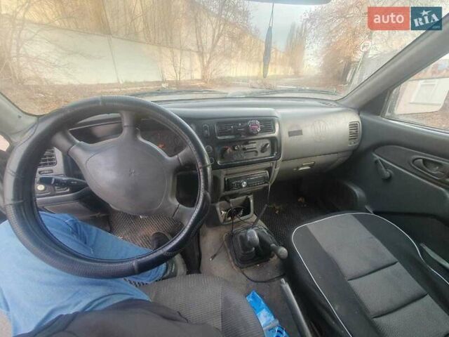 Сірий Міцубісі Л 200, об'ємом двигуна 2.5 л та пробігом 663 тис. км за 5500 $, фото 7 на Automoto.ua
