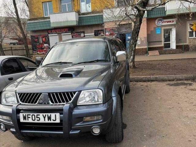 Сірий Міцубісі Л 200, об'ємом двигуна 2.5 л та пробігом 280 тис. км за 5300 $, фото 1 на Automoto.ua