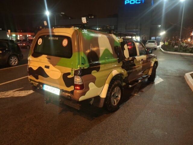 Сірий Міцубісі Л 200, об'ємом двигуна 1.4 л та пробігом 18 тис. км за 7500 $, фото 5 на Automoto.ua