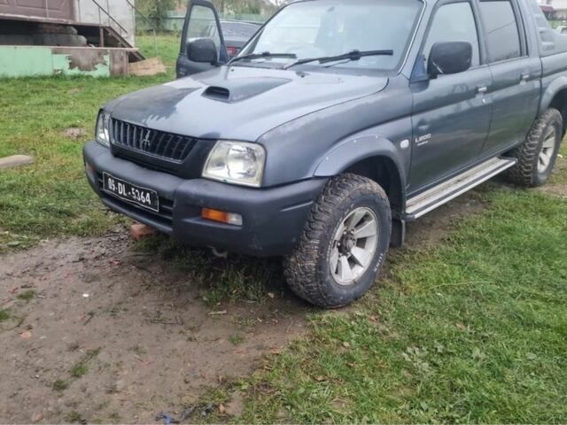 Сірий Міцубісі Л 200, об'ємом двигуна 2.5 л та пробігом 265 тис. км за 5100 $, фото 1 на Automoto.ua