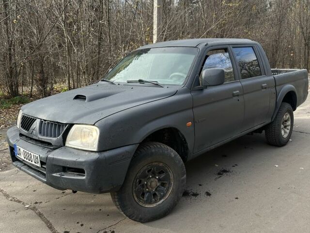 Серый Мицубиси Л 200, объемом двигателя 2.2 л и пробегом 200 тыс. км за 3550 $, фото 4 на Automoto.ua