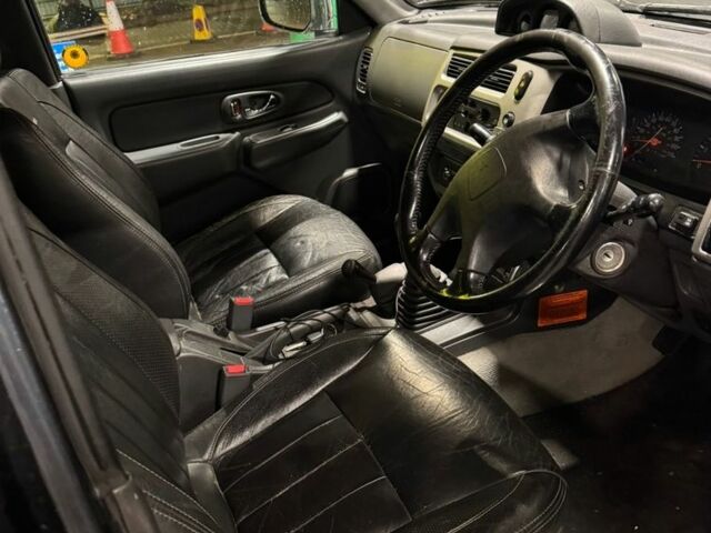 Серый Мицубиси Л 200, объемом двигателя 2.5 л и пробегом 100 тыс. км за 6185 $, фото 4 на Automoto.ua