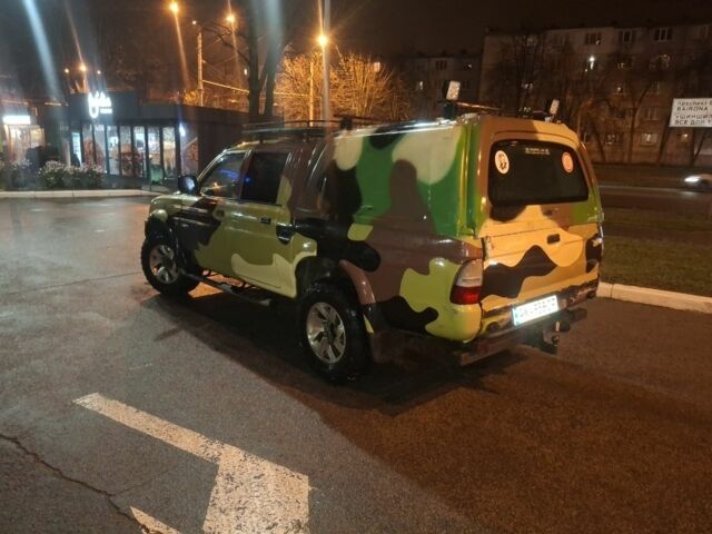 Сірий Міцубісі Л 200, об'ємом двигуна 1.4 л та пробігом 18 тис. км за 7500 $, фото 4 на Automoto.ua