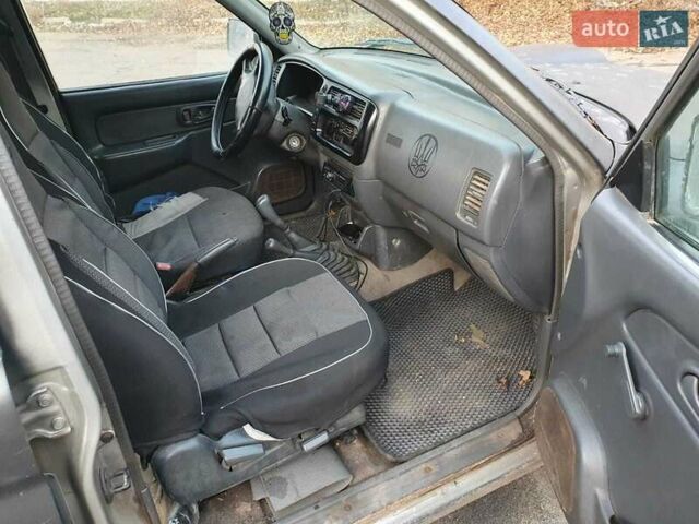 Сірий Міцубісі Л 200, об'ємом двигуна 2.5 л та пробігом 663 тис. км за 5500 $, фото 8 на Automoto.ua