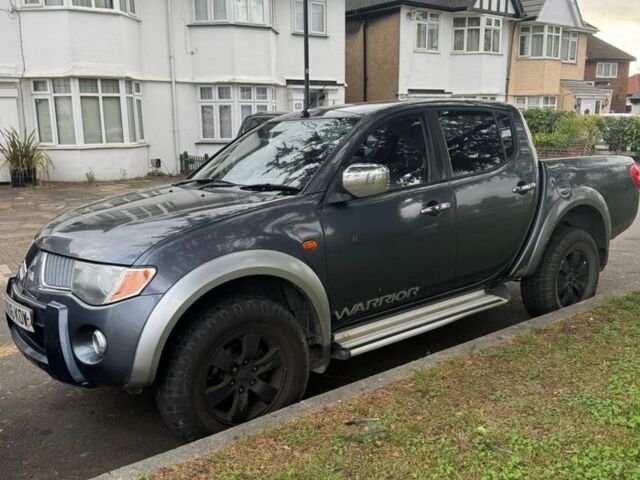 Серый Мицубиси Л 200, объемом двигателя 2.5 л и пробегом 160 тыс. км за 6376 $, фото 1 на Automoto.ua