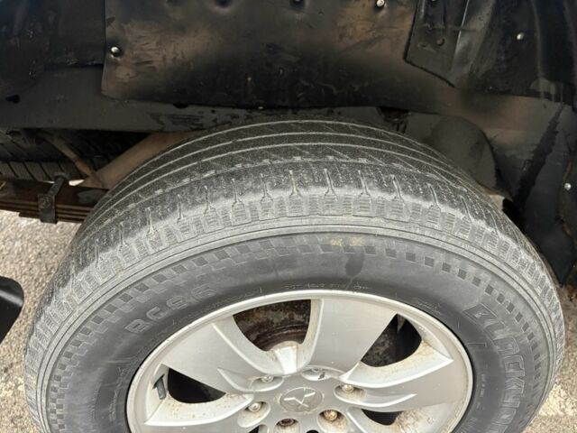 Серый Мицубиси Л 200, объемом двигателя 2.5 л и пробегом 130 тыс. км за 7452 $, фото 7 на Automoto.ua