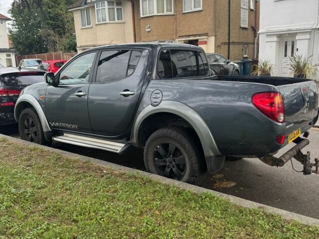 Серый Мицубиси Л 200, объемом двигателя 2.5 л и пробегом 160 тыс. км за 6376 $, фото 3 на Automoto.ua