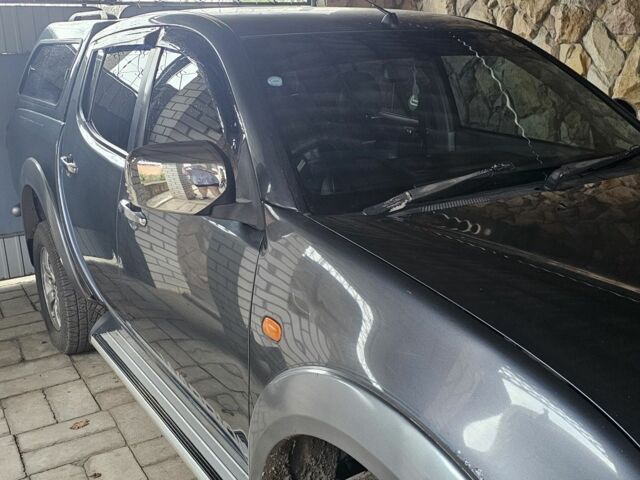 Серый Мицубиси Л 200, объемом двигателя 0 л и пробегом 234 тыс. км за 7000 $, фото 4 на Automoto.ua