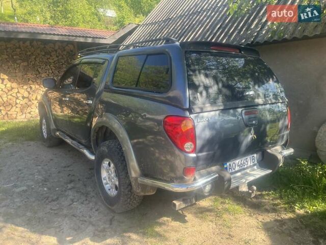 Серый Мицубиси Л 200, объемом двигателя 2.48 л и пробегом 250 тыс. км за 13500 $, фото 8 на Automoto.ua