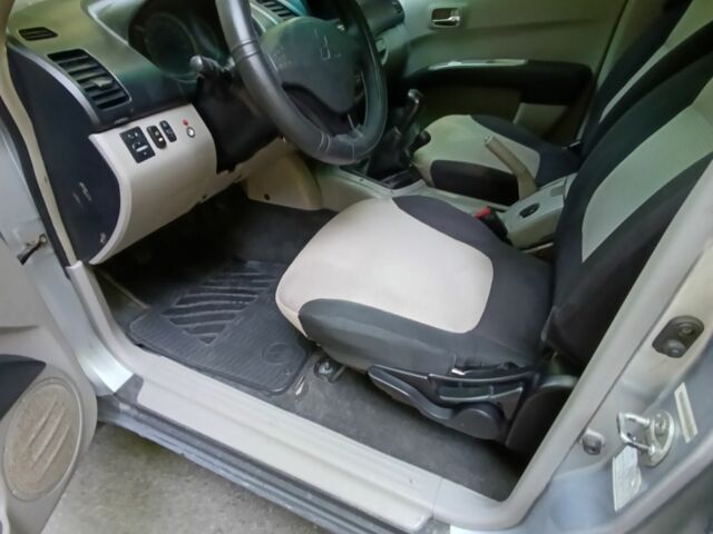 Серый Мицубиси Л 200, объемом двигателя 2.5 л и пробегом 270 тыс. км за 11800 $, фото 20 на Automoto.ua