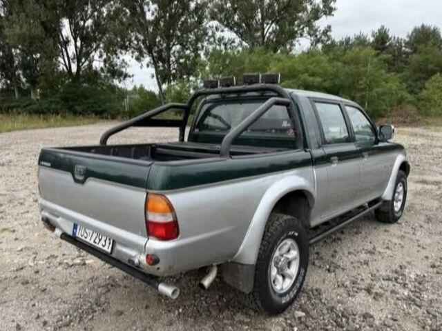 Сірий Міцубісі Л 200, об'ємом двигуна 2.5 л та пробігом 279 тис. км за 2650 $, фото 3 на Automoto.ua