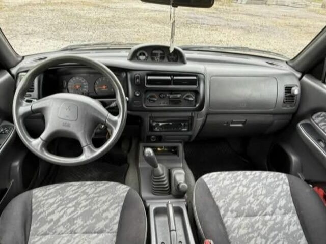 Сірий Міцубісі Л 200, об'ємом двигуна 2.5 л та пробігом 279 тис. км за 2650 $, фото 6 на Automoto.ua