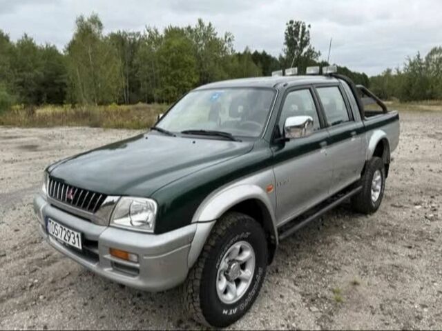 Сірий Міцубісі Л 200, об'ємом двигуна 2.5 л та пробігом 279 тис. км за 2650 $, фото 1 на Automoto.ua