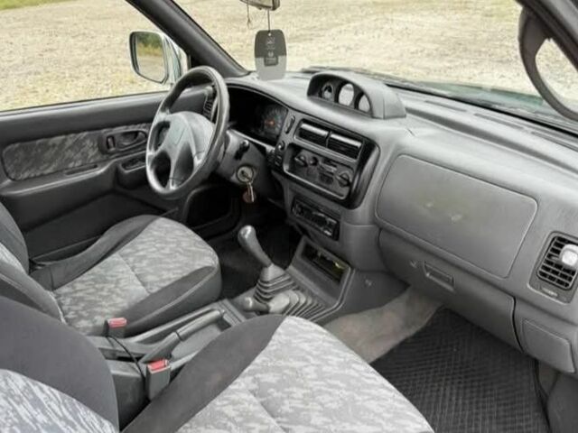 Сірий Міцубісі Л 200, об'ємом двигуна 2.5 л та пробігом 279 тис. км за 2650 $, фото 5 на Automoto.ua