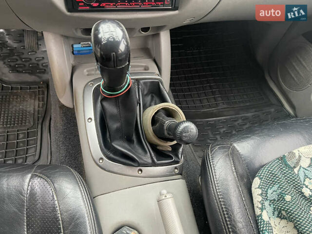Серый Мицубиси Л 200, объемом двигателя 2.5 л и пробегом 292 тыс. км за 9500 $, фото 8 на Automoto.ua