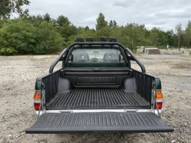 Сірий Міцубісі Л 200, об'ємом двигуна 2.5 л та пробігом 279 тис. км за 2650 $, фото 4 на Automoto.ua