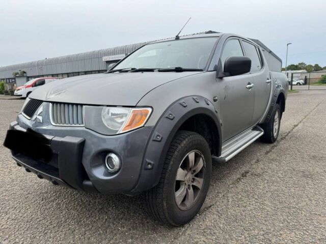 Серый Мицубиси Л 200, объемом двигателя 0 л и пробегом 140 тыс. км за 6500 $, фото 3 на Automoto.ua