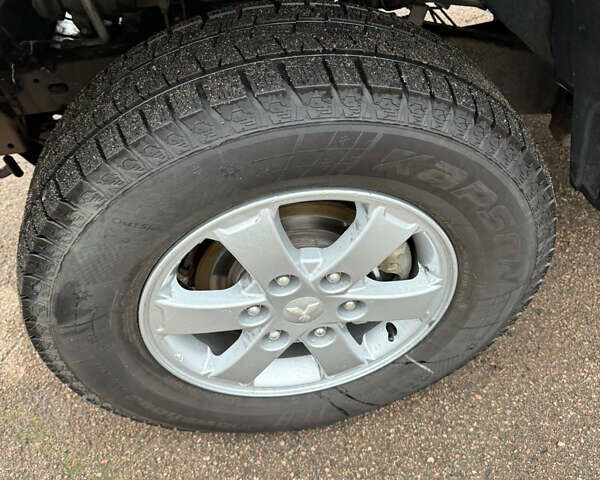 Сірий Міцубісі Л 200, об'ємом двигуна 2.5 л та пробігом 235 тис. км за 10700 $, фото 11 на Automoto.ua