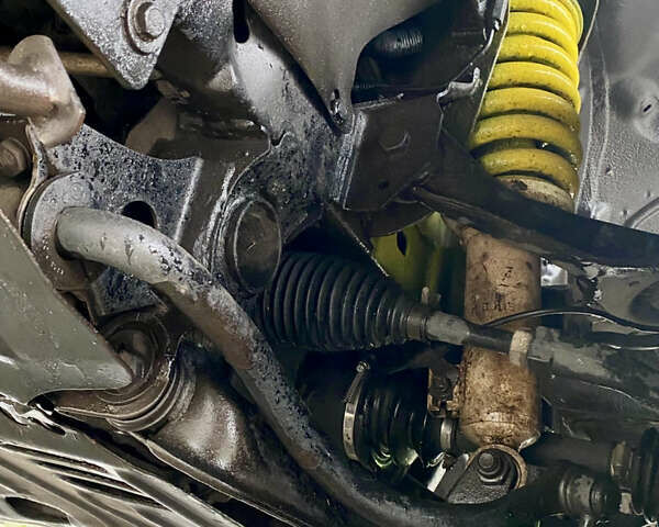 Серый Мицубиси Л 200, объемом двигателя 2.48 л и пробегом 185 тыс. км за 13500 $, фото 3 на Automoto.ua