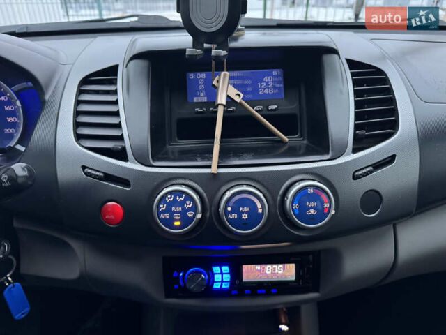 Сірий Міцубісі Л 200, об'ємом двигуна 2.48 л та пробігом 258 тис. км за 11990 $, фото 17 на Automoto.ua
