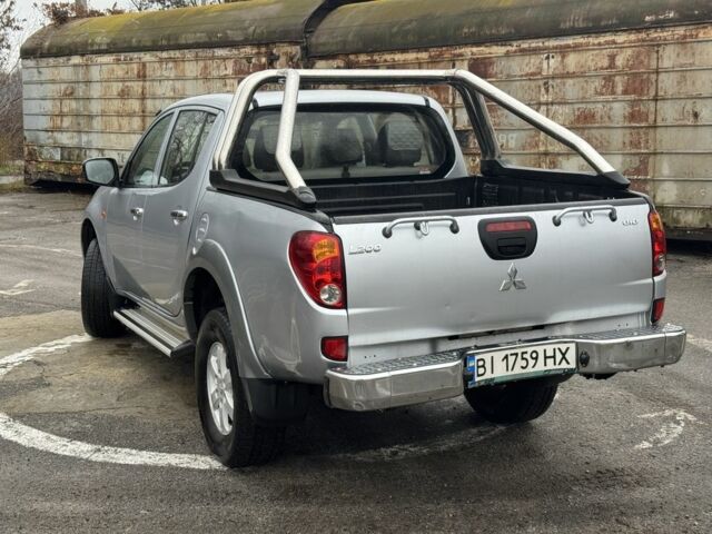 Сірий Міцубісі Л 200, об'ємом двигуна 2.5 л та пробігом 194 тис. км за 11500 $, фото 2 на Automoto.ua