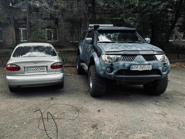 Мицубиси Л 200 2008 в Славянске на Automoto.ua Серый Мицубиси Л 200, объемом двигателя 2.5 л и пробегом 222 тыс. км за 16410 $, фото 4 на Automoto.ua