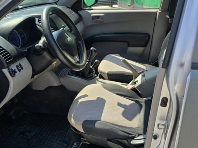 Серый Мицубиси Л 200, объемом двигателя 2 л и пробегом 244 тыс. км за 3600 $, фото 3 на Automoto.ua