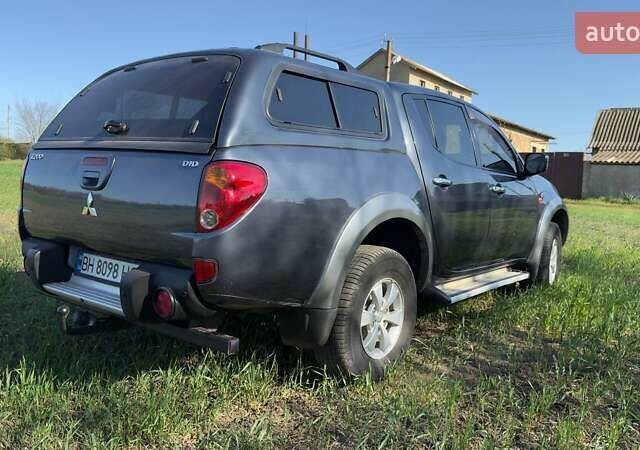 Серый Мицубиси Л 200, объемом двигателя 2.48 л и пробегом 234 тыс. км за 13000 $, фото 19 на Automoto.ua