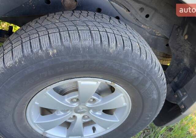 Серый Мицубиси Л 200, объемом двигателя 2.48 л и пробегом 234 тыс. км за 13000 $, фото 40 на Automoto.ua