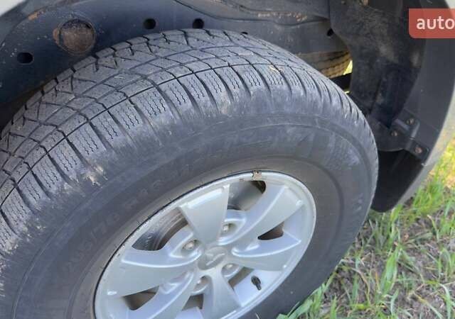 Серый Мицубиси Л 200, объемом двигателя 2.48 л и пробегом 234 тыс. км за 13000 $, фото 41 на Automoto.ua