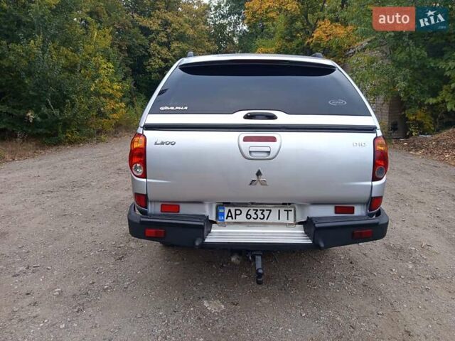 Сірий Міцубісі Л 200, об'ємом двигуна 2.48 л та пробігом 390 тис. км за 10900 $, фото 2 на Automoto.ua