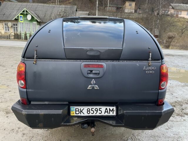 Сірий Міцубісі Л 200, об'ємом двигуна 2.5 л та пробігом 376 тис. км за 12400 $, фото 16 на Automoto.ua