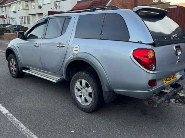 Серый Мицубиси Л 200, объемом двигателя 2.5 л и пробегом 116 тыс. км за 6384 $, фото 3 на Automoto.ua