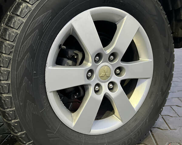 Сірий Міцубісі Л 200, об'ємом двигуна 2.48 л та пробігом 236 тис. км за 15400 $, фото 27 на Automoto.ua