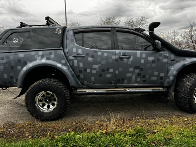 Міцубісі Л 200 2008 у Краматорске на Automoto.ua Сірий Міцубісі Л 200, об'ємом двигуна 0 л та пробігом 220 тис. км за 16410 $, фото 12 на Automoto.ua