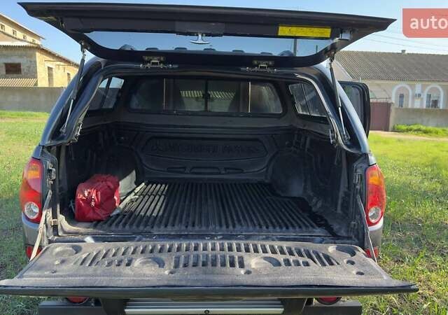 Серый Мицубиси Л 200, объемом двигателя 2.48 л и пробегом 234 тыс. км за 13000 $, фото 35 на Automoto.ua