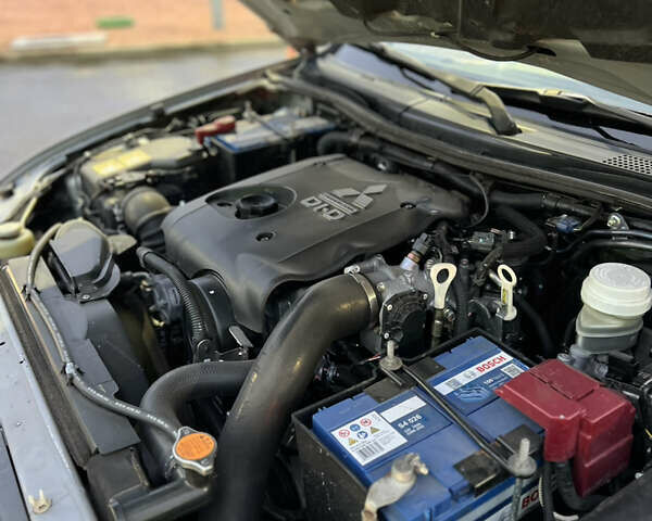 Сірий Міцубісі Л 200, об'ємом двигуна 2.48 л та пробігом 236 тис. км за 15400 $, фото 22 на Automoto.ua