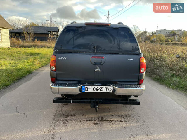 Міцубісі Л 200 2008 у Житомирі на Automoto.ua Сірий Міцубісі Л 200, об'ємом двигуна 2.48 л та пробігом 273 тис. км за 10800 $, фото 5 на Automoto.ua