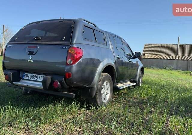 Серый Мицубиси Л 200, объемом двигателя 2.48 л и пробегом 234 тыс. км за 13000 $, фото 22 на Automoto.ua