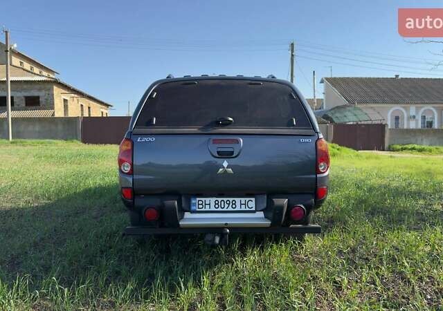 Серый Мицубиси Л 200, объемом двигателя 2.48 л и пробегом 234 тыс. км за 13000 $, фото 17 на Automoto.ua