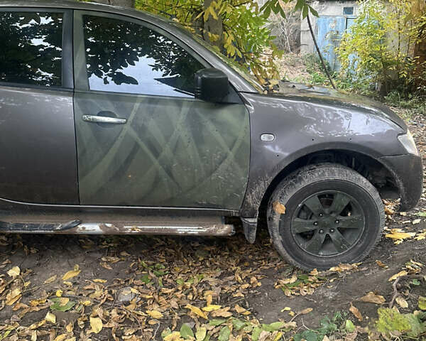 Мицубиси Л 200 2010 в Харькове на Automoto.ua Серый Мицубиси Л 200, объемом двигателя 2.48 л и пробегом 200 тыс. км за 7900 $, фото 2 на Automoto.ua