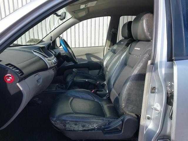 Серый Мицубиси Л 200, объемом двигателя 2.5 л и пробегом 188 тыс. км за 6798 $, фото 3 на Automoto.ua