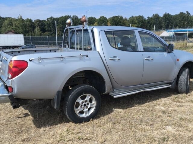 Сірий Міцубісі Л 200, об'ємом двигуна 2.5 л та пробігом 300 тис. км за 5242 $, фото 2 на Automoto.ua