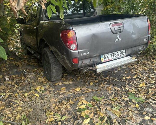 Мицубиси Л 200 2010 в Харькове на Automoto.ua Серый Мицубиси Л 200, объемом двигателя 2.48 л и пробегом 200 тыс. км за 7900 $, фото 7 на Automoto.ua