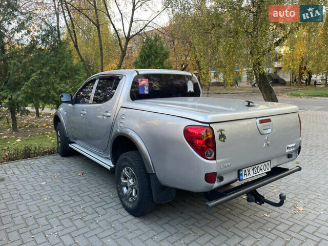 Серый Мицубиси Л 200, объемом двигателя 2.48 л и пробегом 180 тыс. км за 12200 $, фото 8 на Automoto.ua