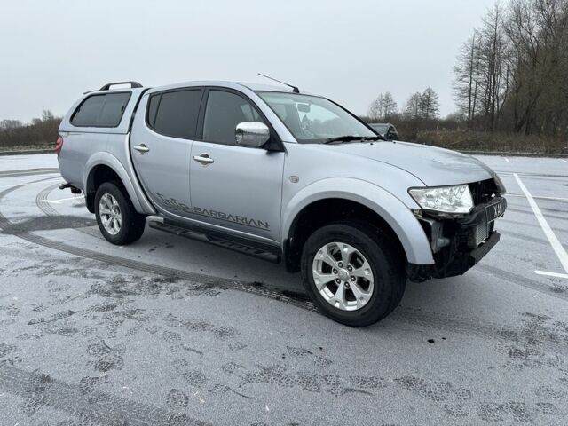 Серый Мицубиси Л 200, объемом двигателя 2.5 л и пробегом 155 тыс. км за 7888 $, фото 10 на Automoto.ua