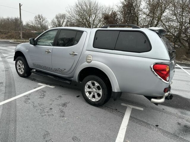 Серый Мицубиси Л 200, объемом двигателя 2.5 л и пробегом 155 тыс. км за 7888 $, фото 11 на Automoto.ua