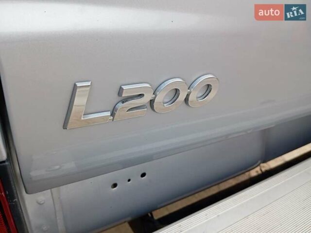 Сірий Міцубісі Л 200, об'ємом двигуна 2.48 л та пробігом 124 тис. км за 14200 $, фото 34 на Automoto.ua