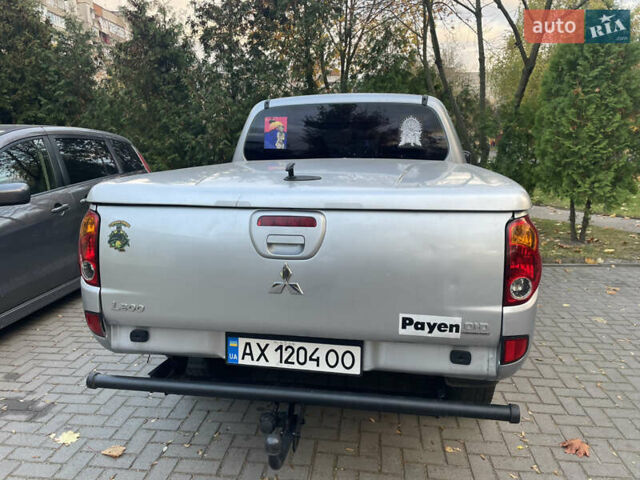 Серый Мицубиси Л 200, объемом двигателя 2.48 л и пробегом 180 тыс. км за 12200 $, фото 10 на Automoto.ua