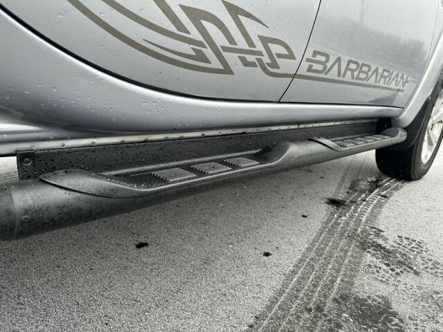 Серый Мицубиси Л 200, объемом двигателя 2.5 л и пробегом 155 тыс. км за 7888 $, фото 22 на Automoto.ua